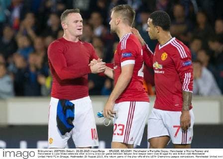 - BRUGGE, BELGIUM: Manchester s Memphis Depay, Manchester s Wayne Rooney and Manchester s Luke Shaw celebrate after winning a soccer game between Belgian first league team Club Brugge KV and British club Manchester United ManU FC in Brugge, Wednesday 26 August 2015, the return game of the play-offs of the UEFA Champions League competition. Manchester United won the first leg 3-1. KURTxDESPLENTER x04687729x