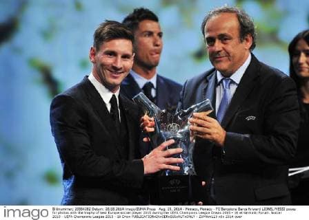 Aug. 28, 2014 - Monaco, Monaco - FC Barcelona Barca forward LIONEL MESSI poses for photos with the trophy of best Europe soccer player 2015 during the UEFA Champions League Draws 2015 - 16 at Grimaldi Forum. Soccer 2015 - UEFA Champions League 2015 - 16 Draw - ZUMAm119