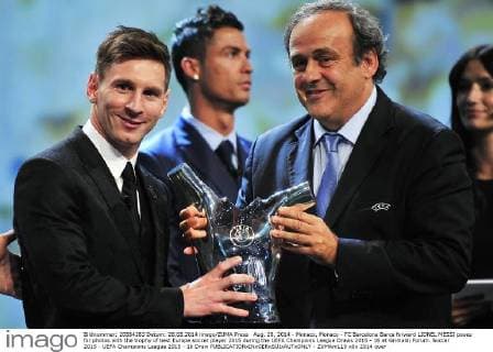 Aug. 28, 2014 - Monaco, Monaco - FC Barcelona Barca forward LIONEL MESSI poses for photos with the trophy of best Europe soccer player 2015 during the UEFA Champions League Draws 2015 - 16 at Grimaldi Forum. Soccer 2015 - UEFA Champions League 2015 - 16 Draw - ZUMAm119