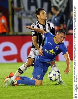 26.08.2015 Belgrade(Serbia) FK Partizan-FC Bate Borisov 2nd leg play off champions league men s football Nikolai Signevich (in front) FC Bate Borisov stopped Fabricio(behind) FK Partizan :