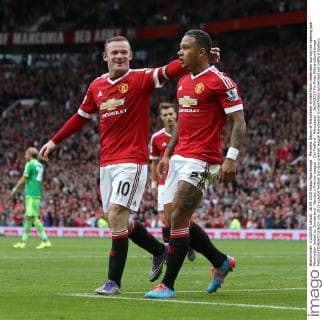 Memphis Depay of Manchester United ManU celebrates scoring the opening goal - Manchester United vs. Sunderland - Barclay s Premier League - Old Trafford - Manchester - 26 09 2015 Pic Philip Oldham SportImage EDITORIAL USE ONLY. No use with unauthorised audio, video, data, fixture lists, club league logos or live services. Online in-match use limited to 120 images, no video emulation. No use in betting, games or single club league player publications.