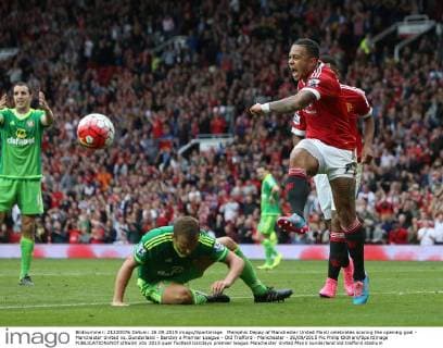 Memphis Depay of Manchester United ManU celebrates scoring the opening goal - Manchester United vs. Sunderland - Barclay s Premier League - Old Trafford - Manchester - 26 09 2015 Pic Philip Oldham SportImage EDITORIAL USE ONLY. No use with unauthorised audio, video, data, fixture lists, club league logos or live services. Online in-match use limited to 120 images, no video emulation. No use in betting, games or single club league player publications.