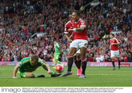 Memphis Depay of Manchester United ManU celebrates scoring the opening goal - Manchester United vs. Sunderland - Barclay s Premier League - Old Trafford - Manchester - 26 09 2015 Pic Philip Oldham SportImage EDITORIAL USE ONLY. No use with unauthorised audio, video, data, fixture lists, club league logos or live services. Online in-match use limited to 120 images, no video emulation. No use in betting, games or single club league player publications.