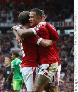 Memphis Depay of Manchester United ManU celebrates scoring the opening goal - Manchester United vs. Sunderland - Barclay s Premier League - Old Trafford - Manchester - 26 09 2015 Pic Philip Oldham SportImage EDITORIAL USE ONLY. No use with unauthorised audio, video, data, fixture lists, club league logos or live services. Online in-match use limited to 120 images, no video emulation. No use in betting, games or single club league player publications.