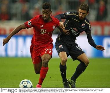 SOCCER - CL, Bayern vs Zagreb MUNICH,GERMANY,29.SEP.15 - SOCCER - UEFA Champions League, group stage, FC Bayern Muenchen vs GNK Dinamo Zagreb. Image shows Kingsley Coman (Bayern) and Josip Pivaric (Zagreb). GEPAxpictures xThomasxBachun