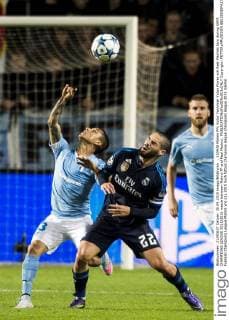 , 150930 Malmö FFs Victor Yoshimar Yotun Flores och Real Madrids Isco during UEFA CHAMPIONS LEAGUE 2015 2016 match between Malmö FF and Real Madrid.. Copyright: PETTERxARVIDSON BB150930PA275