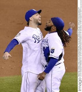 Oct. 28, 2015 - Kansas City, MO, USA - Kansas City Royals first baseman Eric Hosmer, left, and starting pitcher Johnny Cueto bump chests after the Royals defeat the New York Mets, 7-1, in Game 2 of the World Series for a 2-0 series lead on Wednesday, Oct. 28, 2015, at Kauffman Stadium in Kansas City, Mo. World Series: NY Mets at Kansas City, Game 2 - ZUMAm67_