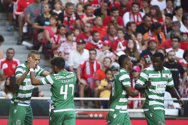 Aug. 31, 2014 - Lisbon, Portugal - Sporting«s forward Islam Slimani (L) celebrates with team mates after scoring a goal during the Portuguese Liga football match SL Benfica vs Sporting CP at Luz stadium in Lisbon on August 31, 2014. NURPHOTO CARLOS COSTA FBL-LIGA-SPORTING-BENFICA - ZUMAn230