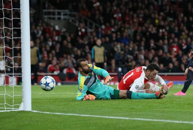 Arsenal s Mesut Ozil scoring his sides opening goal UEFA Champions League- Arsenal v Dinamo Zagreb - Emirates Stadium - England - 24th November 2015 - Picture David Klein Sportimage EDITORIAL USE ONLY. No use with unauthorised audio, video, data, fixture lists, club league logos or live services. Online in-match use limited to 120 images, no video emulation. No use in betting, games or single club league player publications.