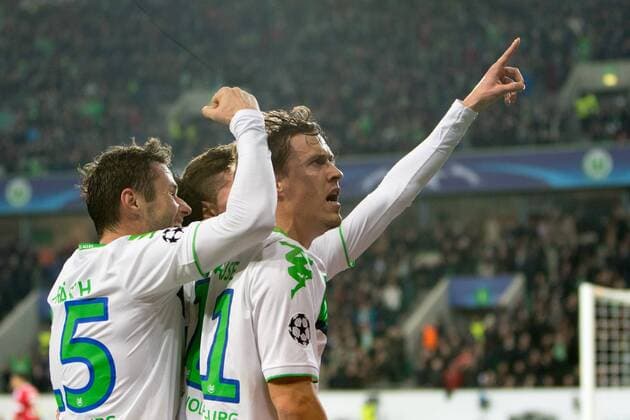 Fußball, Champions League, VfL Wolfsburg - Manchester United Fußball, UEFA Champions League, VfL Wolfsburg - Manchester United ManU Christian Träsch (Wolfsburg) und Max Kruse (Wolfsburg) Jubel, Torjubel, Freude, Emotion, Torerfolg, Aktion, action, goal, goal celebration, celebrates. xtgx