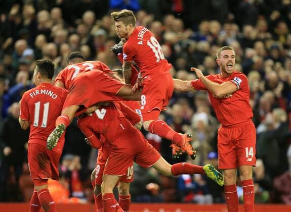 Liverpool s Jordan Henderson celebrates with goalscorer Christian Benteke Barclays Premier League- Liverpool vs Leicester City - Anfield - England - 26th December 2015 - Picture David Klein Sportimage EDITORIAL USE ONLY. No use with unauthorised audio, video, data, fixture lists, club league logos or live services. Online in-match use limited to 120 images, no video emulation. No use in betting, games or single club league player publications.