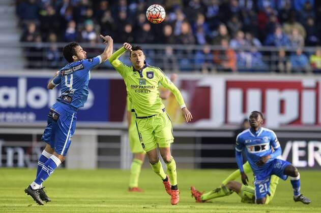 - GENT, BELGIUM: Gent s Rafinha Rafael Scapini de Almeida and Anderlecht s Matias Suarez fight for the ball during the Jupiler Pro League match between KAA Gent and RSC Anderlecht, in Gent, Sunday 17 January 2016, on day 22 of the Belgian soccer championship. YORICKxJANSENS x04775348x