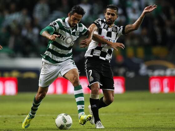 Lisbon, Portugal - Sporting s midfielder Ezequiel Schelotto (L) vies for the ball with Boavista s defender Ruben Ribeiro (R) during the Portuguese League football match between Sporting CP and Boavista FC at Jose Alvalade Stadium in Lisbon on February 21, 2016. NURPHOTO CARLOS PALMA. FBL-LIGA-POR-SPORTING-BOAVISTA - ZUMAn230