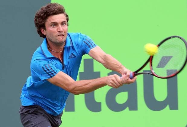 March 30, 2016 - Key Biscayne, FL, USA - France s Gilles Simon returns a shot against Belgium s David Goffin during the quarterfinals of the Miami Open at the Tennis Center at Crandon Park in Key Biscayne, Fla., on Wednesday, March 30, 2016. Goffin advanced, 3-6, 6-2, 6-1. Miami Open - ZUMAm67_