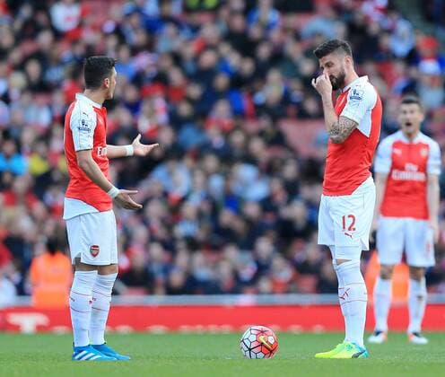 Arsenal s Mesut Ozil and Olivier Giroud look on dejected after Crystal Palace s opening goal during the Premier League match at the Emirates Stadium. Photo credit should read: David Klein Sportimage EDITORIAL USE ONLY. No use with unauthorised audio, video, data, fixture lists, club league logos or live services. Online in-match use limited to 120 images, no video emulation. No use in betting, games or single club league player publications.