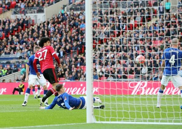 Manchester United ManU s Marouane Fellaini scoring his sides opening goal during the Emirates FA Cup, Semi-Final match at Wembley Stadium, London. Photo credit should read: David Klein Sportimage EDITORIAL USE ONLY. No use with unauthorised audio, video, data, fixture lists, club league logos or live services. Online in-match use limited to 120 images, no video emulation. No use in betting, games or single club league player publications.