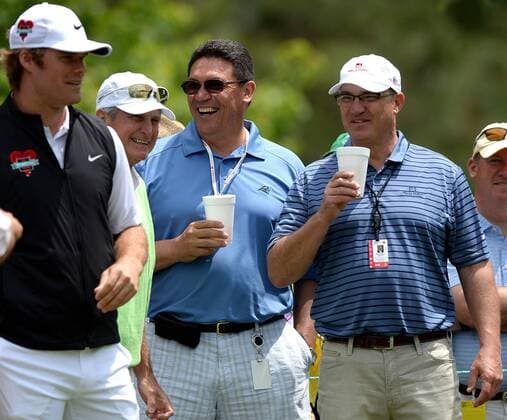 May 4, 2016 - Charlotte, NC, USA - Carolina Panthers tight end Greg Olsen, left, looks on as Mac Everett, Panthers head coach Ron Rivera, center, and Charlotte Regional President for Wells Fargo Kendall Alley, right, laugh at the second tee box during a Pro-Am at Quail Hollow Club in Charlotte, N.C., on Wednesday, May 4, 2016. Wells Fargo Pro-Am - ZUMAm67_
