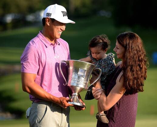 May 8, 2016 - Charlotte, NC, USA - James Hahn celebrates his victory in the Wells Fargo Championship with his daughter, Kailee, 14 months, and wife, Stephanie Hahn, on Sunday, May 8, 2016, at Quail Hollow Club in Charlotte, N.C. Wells Fargo Championship - ZUMAm67_