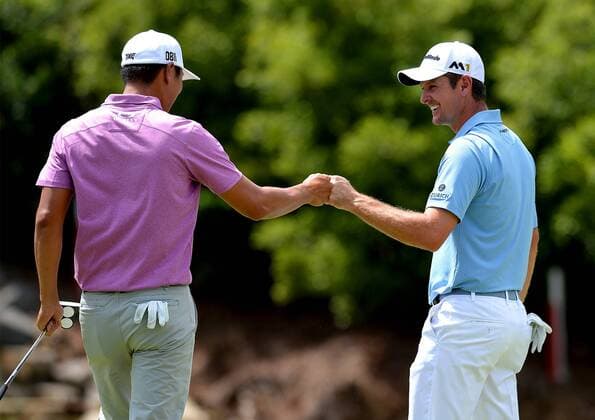 May 8, 2016 - Charlotte, NC, USA - Justin Rose, right, fist bumps James Hahn, left, after Hahn eagled the seventh hole during the Wells Fargo Championship on Sunday, May 8, 2016, at Quail Hollow Club in Charlotte, N.C. Wells Fargo Championship - ZUMAm67_