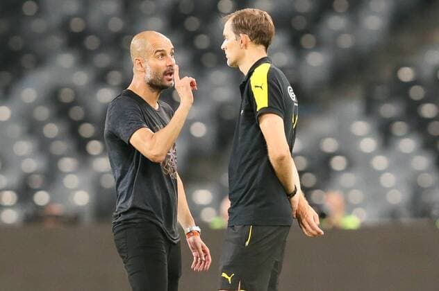 Head coach Pep Guardiola of Manchester City, left, talks to head coach Thomas Tuchel of Borussia Dortmund before the penalty shootout of the Shenzhen match of the 2016 International Champions Cup China in Shenzhen city, south China s Guangdong province, 28 July 2016. Pep Guardiola got his first taste of victory as Manchester City s manager Thursday (28 July 2016) night after beating Borussia Dortmund on penalties in a friendly, but expressed concern about the looming English Premier League season. Football today is tough, said Guardiola, whose side beat their German opposition in the southern Chinese city of Shenzhen. City won, and finally got the workout Guardiola had craved, thanks to a 6-5 penalty shootout win over Dortmund, after the game ended one apiece. City keeper Angus Gunn was the hero of penalties with three saves, including the one sealing their victory when he palmed away Mikel Merino s attempt. Manchester City beat Dortmund on penalties in Shenzhen 20160728_12408