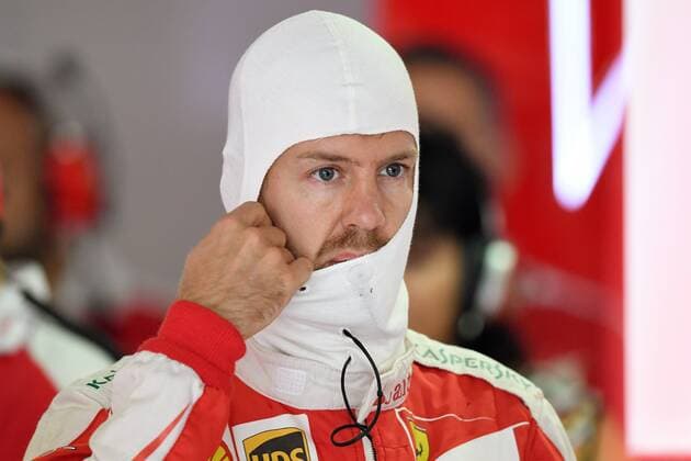 Sebastian VETTEL,GER (Scuderia Ferrari) in der Box mit Feuerhaube, Aktion,Einzelbild, angeschnittenes Einzelmotiv,Portraet,Portrait,Porträt. 1.Training,Formel 1:GP von Deutschland,Hockenheimring,Saison2016,am 28.07.2016.