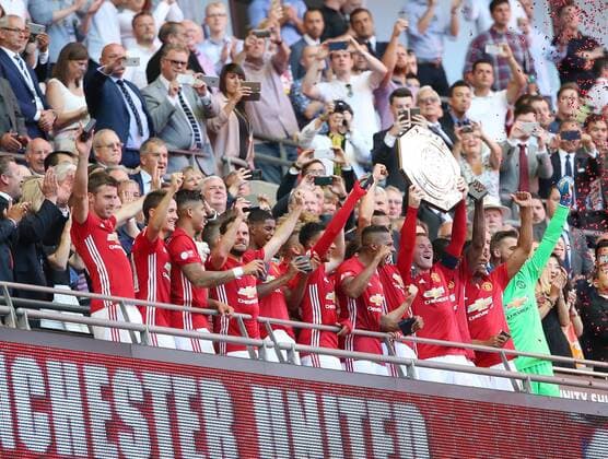 Manchester United ManU s Wayne Rooney celebrates with the trophy during the FA Community Shield match at Wembley Stadium, London. Picture date August 7th, 2016 Pic David Klein Sportimage EDITORIAL USE ONLY. No use with unauthorised audio, video, data, fixture lists, club league logos or live services. Online in-match use limited to 120 images, no video emulation. No use in betting, games or single club league player publications.