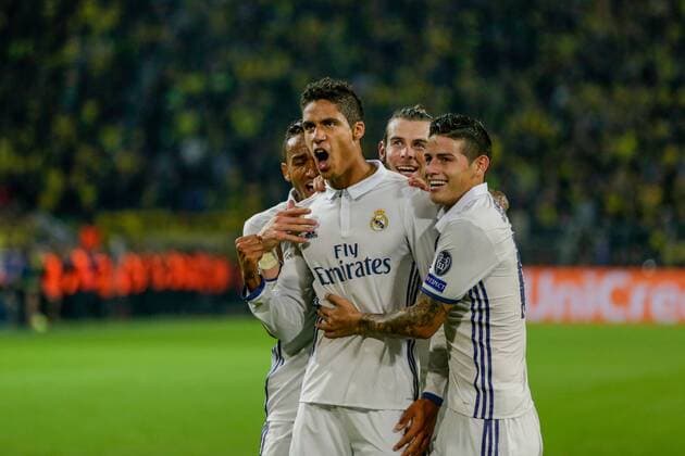 GER, Champions League, Borussia Dortmund vs Real Madrid 27.09.2016, Signal Iduna Park, Dortmund, GER, Champions League, Borussia Dortmund vs Real Madrid, im Bild picture shows VARANE (Real Madrid 5) bejubelt sein Tor zum 1:2 celebrates after scoring 1:2 with BALE (Real Madrid 11), CARVAJAL (Real Madrid 2), Foto@ nordphoto Rauch nordphotox xrauch
