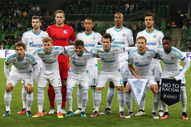 KRASNODAR, RUSSIA - OCTOBER 20, 2016: FC Schalke 04 s Benjamin Stambouli, Maximilian Max Meyer, Junior Caicara, Yevhen Konoplyanka, Benedikt Hoewedes, Abdul Baba Rahman (L-R front), Matija Nastasic, goalkeeper Ralf Faehrmann, Dennis Aogo, Naldo, and Franco Di Santo (L-R background) pose for a group photo ahead of their 2016 17 Season UEFA Europa League Group I Round 3 football match against FC Krasnodar at Krasnodar Stadium. Vitaly Timkiv TASS TS0350D1