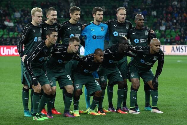 KRASNODAR, RUSSIA - OCTOBER 20, 2016: FC Krasnodar s Odil Ahmedov, Sergei Petrov, Joaozinho, Kouassi Eboue, Ari (L-R front), Vyacheslav Podberyozkin, Artur Jedrzejczyk, Alexander Martynovich, goalkeeper Stanislav Kritsyuk, Andreas Granqvist, and Charles Kabore (L-R background) pose for a group photo ahead of their 2016 17 Season UEFA Europa League Group I Round 3 football match against FC Schalke 04 at Krasnodar Stadium. Vitaly Timkiv TASS TS0350D2