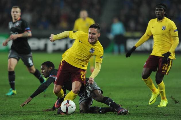 Jordy Clasie, from left, and Cuco Martina of Southampton and Daniel Holzer, front, and Costa Nhamoinesu of Sparta in action during the European league, 5th round, AC Sparta Praha - Southampton FC match in Prague, Czech Republic, on Thursday, November 24, 2016. (CTKxPhoto OndrejxDeml) CTKPhotoP201611240953201 deml 9