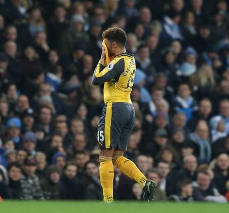 Alex Oxlade-Chamberlain of Arsenal hides his face after coming on as a substitute he is taken off during the English Premier League match at the Etihad Stadium, Manchester. Picture date: December 18th, 2016. Picture credit should read: Simon Bellis Sportimage EDITORIAL USE ONLY. No use with unauthorised audio, video, data, fixture lists, club league logos or live services. Online in-match use limited to 120 images, no video emulation. No use in betting, games or single club league player publications.