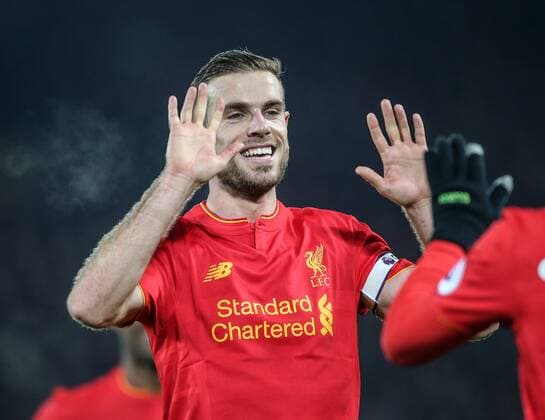Liverpool s Jordan Henderson celebrates his sides fourth goal during the Premier League match at Anfield Stadium, Liverpool. Picture date December 27th, 2016 Pic David Klein Sportimage EDITORIAL USE ONLY. No use with unauthorised audio, video, data, fixture lists, club league logos or live services. Online in-match use limited to 120 images, no video emulation. No use in betting, games or single club league player publications.