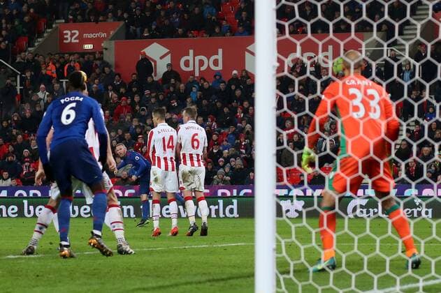 Manchester United ManU s Wayne Rooney scoring his sides opening goal during the Premier League match at Bet365 Stadium, Stoke. Picture date January 21st, 2017 Pic David Klein Sportimage EDITORIAL USE ONLY. No use with unauthorised audio, video, data, fixture lists, club league logos or live services. Online in-match use limited to 120 images, no video emulation. No use in betting, games or single club league player publications.