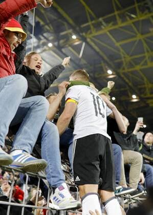 Lukas PODOLSKI, DFB 10 Schlussjubel Abschied Fan, Fans, Fussballfans, supporters, spectators, Zuschauer, Jacke, Kutte, Weste, Fankurve, Schals Fanschals, Maske, Verkleidung, DEUTSCHLAND - ENGLAND (1 -0 ) Freundschaftsspiel, friendly match, Abschiedsspiel Lukas Podolski, Deutsche Fussball Nationalmannschaft, DFB am 22.03.2017 in Dortmund.
