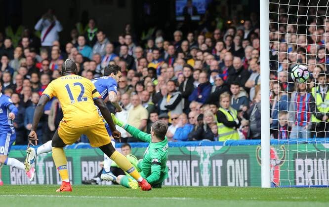 Chelsea s Cesc Fabregas scoring his sides opening goal during the Premier League match at the Stamford Bridge Stadium, London. Picture date: April 1st, 2017. Pic credit should read: David Klein Sportimage via PA Images EDITORIAL USE ONLY. No use with unauthorised audio, video, data, fixture lists, club league logos or live services. Online in-match use limited to 120 images, no video emulation. No use in betting, games or single club league player publications.