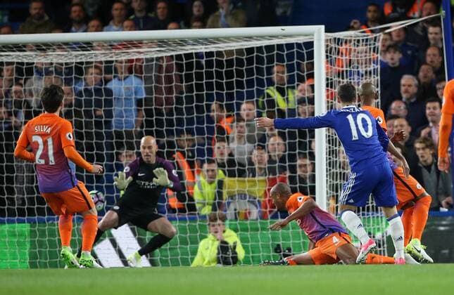 Chelsea s Eden Hazard scoring his sides opening goal during the Premier League match at the Stamford Bridge Stadium, London. Picture date: April 5th, 2017. Pic credit should read: David Klein Sportimage EDITORIAL USE ONLY. No use with unauthorised audio, video, data, fixture lists, club league logos or live services. Online in-match use limited to 120 images, no video emulation. No use in betting, games or single club league player publications.