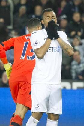 Football - 2016 2017 Premier League - Swansea City vs. Tottenham Hotspur Jordan Ayew of Swansea shoots wide of Michel Vorm of Tottenham Hotspurs , at The Liberty Stadium. COLORSPORT WINSTON BYNORTH