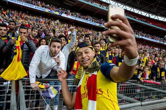 Alex Oxlade-Chamberlain of Arsenal takes a selfie with his mate after the The FA Cup Final match between Arsenal and Aston Villa at Wembley Stadium, London, England on 30 May 2015. Copyright: xLiamxMcAvoyx 04540114