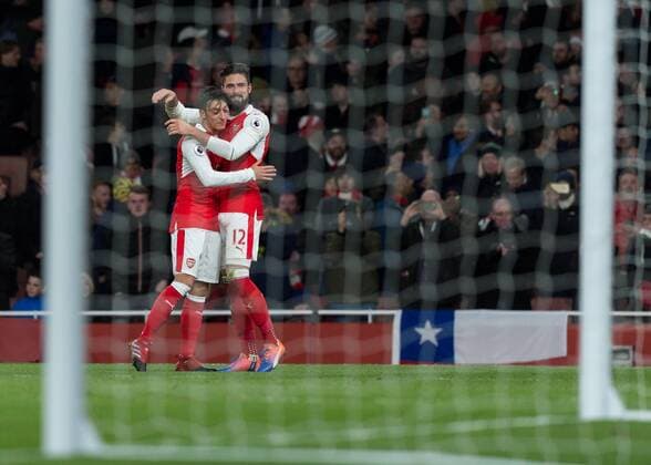 Olivier Giroud of Arsenal celebrates scoring the winning goal with Mesut Özil of Arsenal during the Premier League match between Arsenal and West Bromwich Albion at the Emirates Stadium, London, England on 26 December 2016. Copyright: xVincexxMignottx 13540022