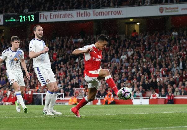 Arsenal s Alexis Sanchez scoring his sides opening goal during the Premier League match at the Emirates Stadium, London. Picture date: May 16th, 2017. Pic credit should read: David Klein Sportimage EDITORIAL USE ONLY. No use with unauthorised audio, video, data, fixture lists, club league logos or live services. Online in-match use limited to 120 images, no video emulation. No use in betting, games or single club league player publications.