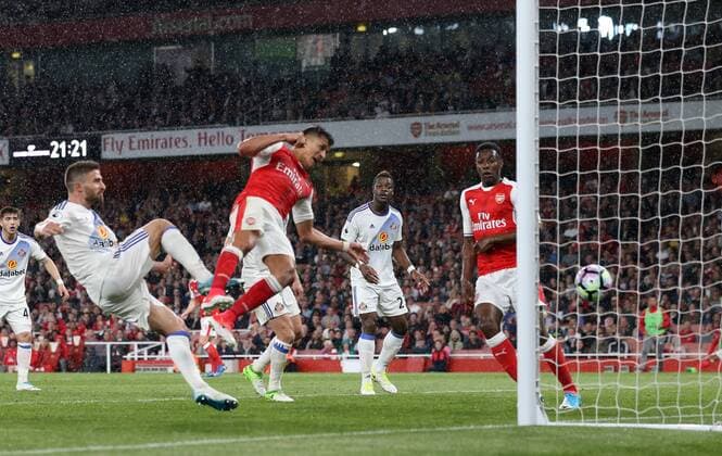 Arsenal s Alexis Sanchez scoring his sides second goal during the Premier League match at the Emirates Stadium, London. Picture date: May 16th, 2017. Pic credit should read: David Klein Sportimage EDITORIAL USE ONLY. No use with unauthorised audio, video, data, fixture lists, club league logos or live services. Online in-match use limited to 120 images, no video emulation. No use in betting, games or single club league player publications.