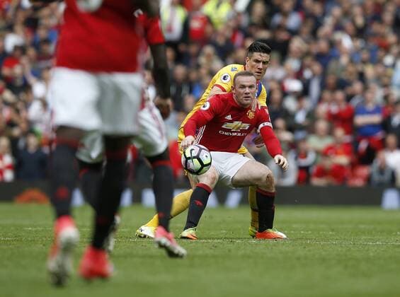 Wayne Rooney of Manchester United ManU in action with Martin Kelly of Crystal Palace during the English Premier League match at the Old Trafford Stadium, Manchester. Picture date: May 21st 2017. Pic credit should read: Simon Bellis Sportimage EDITORIAL USE ONLY. No use with unauthorised audio, video, data, fixture lists, club league logos or live services. Online in-match use limited to 120 images, no video emulation. No use in betting, games or single club league player publications.