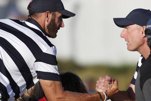 JERSEY CITY, NJ - SEPTEMBER 28: USA golfer Dustin Johnson after winning his match is congratulated by vice captain Jim Furyk during the first round of the Presidents Cup on September 28, 2017, at Liberty National Golf Club in Jersey City, NJ. (Photo by Brian Spurlock Icon Sportswire) GOLF: SEP 28 PGA Golf Herren - The Presidents Cup - First Round Icon17092844 EDITORIAL USE ONLY