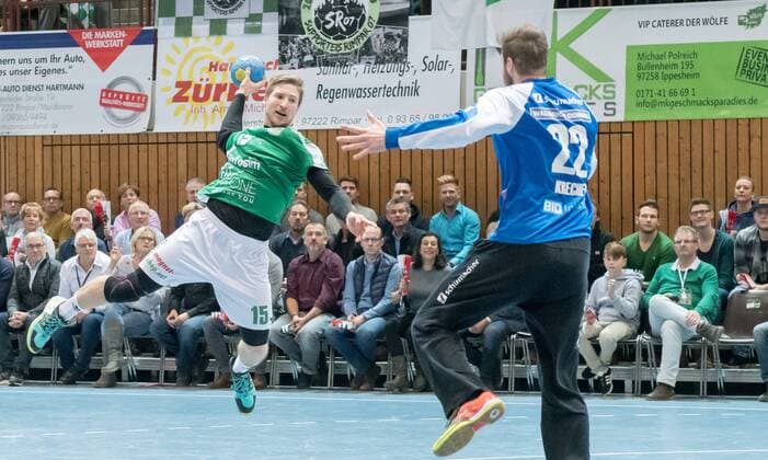 Deutschland, 97072 Würzburg, s.Oliver Arena, 02.12.2017, Handball, Bundesliga, 2. Bundesliga, 2. Liga, DKB Handball Bundesliga, DJK Rimpar Wölfe - HSC 2000 Coburg Bild (v.l.n.r.): Schäffer Jan (DJK Rimpar Wölfe, 15), Krechel Oliver (HSC 2000 Coburg, 22)