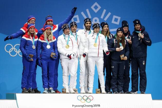 OLYMPICS - 2018 Winter Olympics PYEONGCHANG,SOUTH KOREA,21.FEB.18 - OLYMPICS,BIATHLON - Olympic Winter games Winterspiele Spiele Summer games PyeongChang 2018, Medals Plaza, 2 x 6km and 2 x 7,5km, mixed relay, award ceremony. Image shows Marte Olsbu, Tiril Eckhoff, Johannes Thingnes Boe, Emil Hegle Svendsen (NOR), Marie Dorin Habert, Anais Bescond, Simon Desthieux, Martin Fourcade (FRA) and Lisa Vittozzi, Dorothea Wierer, Lukas Hofer and Dominik Windisch (ITA). Keywords: medals. GEPAxpictures xMaticxKlansek