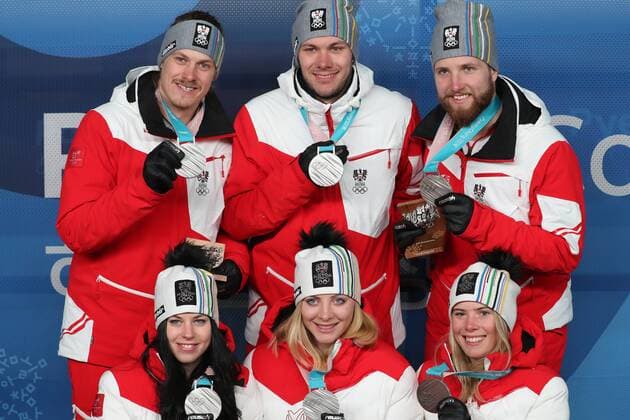 OLYMPICS - 2018 Winter Olympics PYEONGCHANG,SOUTH KOREA,24.FEB.18 - OLYMPICS, ALPINE SKIING - Olympic Winter games Winterspiele Spiele Summer games PyeongChang 2018, Medals Plaza, award ceremony, mixed team competition. Image shows Manuel Feller, Michael Matt, Marco Schwarz, Stephanie Brunner, Katharina Gallhuber and Katharina Liensberger (AUT). Keywords: medal. GEPAxpictures xMathiasxMandl
