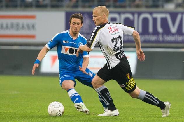 - GENT, BELGIUM: Gent s Brecht Dejaegere and Charleroi s Karel Geraerts fight for the ball during the Jupiler Pro League match between KAA Gent and Sporting Charleroi, Friday 08 May 2015 in Gent, on the seventh day of the Play-off 1. KURTxDESPLENTER x80803182x