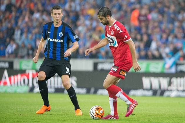 - BRUGGE, BELGIUM: Club s Hans Vanaken and Kortrijk s Benoit Poulain pictured in action during the Jupiler Pro League match between Club Brugge KV and KV Kortrijk, in Brugge, Friday 14 August 2015, on the 4rth day of the Belgian soccer championship. KURTxDESPLENTER x84040876x
