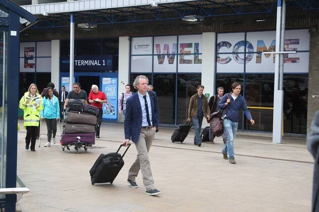 - MANCHESTER, UNITED KINGDOM: Club s head coach Michel Preud homme pictured at the arrival of Club Brugge, at Manchester Airport, England, Monday 17 August 2015. Belgian first league soccer team Club Brugge will play tomorrow the first leg game of the play-offs of the Uefa Champions League competition against British soccer club Manchester United ManU BRUNOxFAHY x84278795x