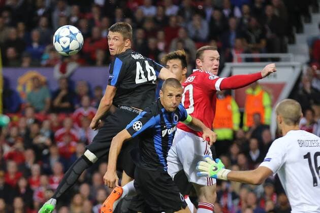 - MANCHESTER, UNITED KINGDOM: Club s Brandon Mechele, Club s Timmy Simons and Manchester s Wayne Rooney fight for the ball during a soccer game between British club Manchester United ManU FC and Belgian team Club Brugge KV in Manchester, United Kingdom, Tuesday 18 August 2015, the first leg of the play-offs for the UEFA Champions League competition. BRUNOxFAHY x84378679x